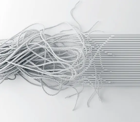 Abstract image of tangled rope transitioning into organized lines representing business process optimization